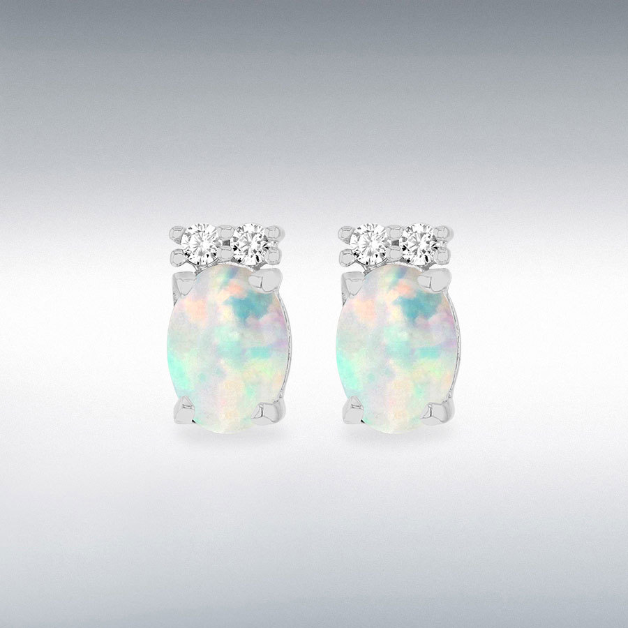 Sterling Silver Rhodium Plated Oval Synthetic Opal and White CZ 5mm x 9mm Tapered Shoulder Stud Earrings