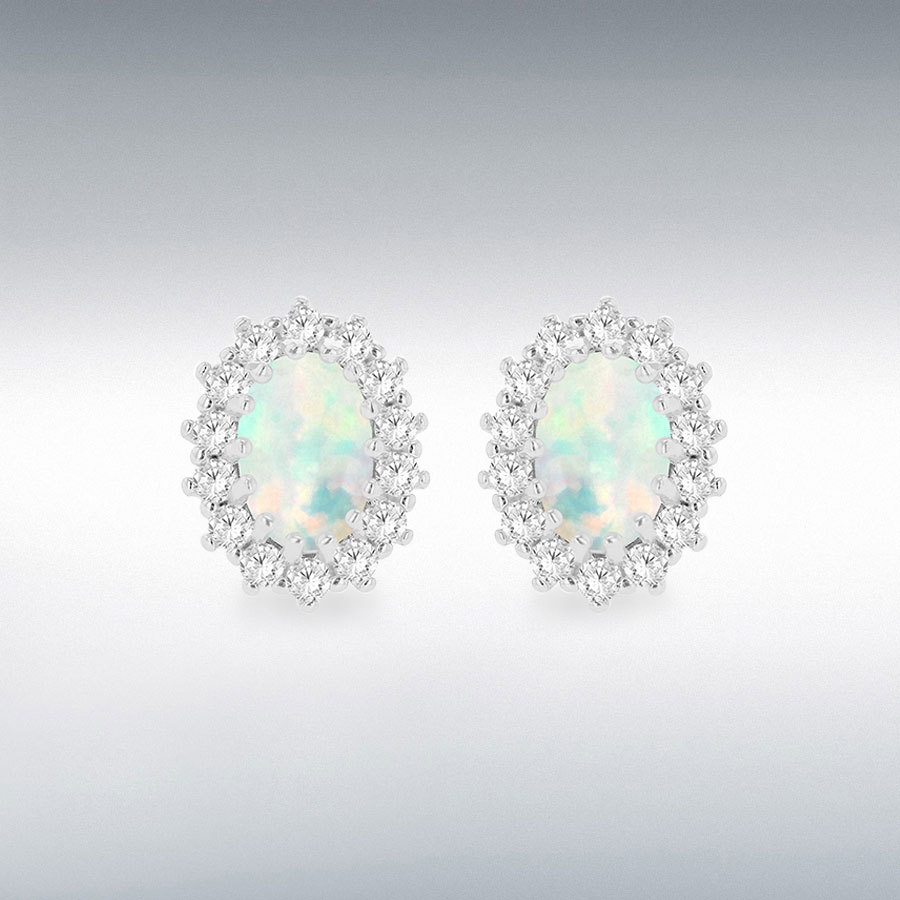Sterling Silver Rhodium Plated Oval Synthetic Opal and White CZ 7.5mm x 9.5mm Flower Cluster Stud Earrings