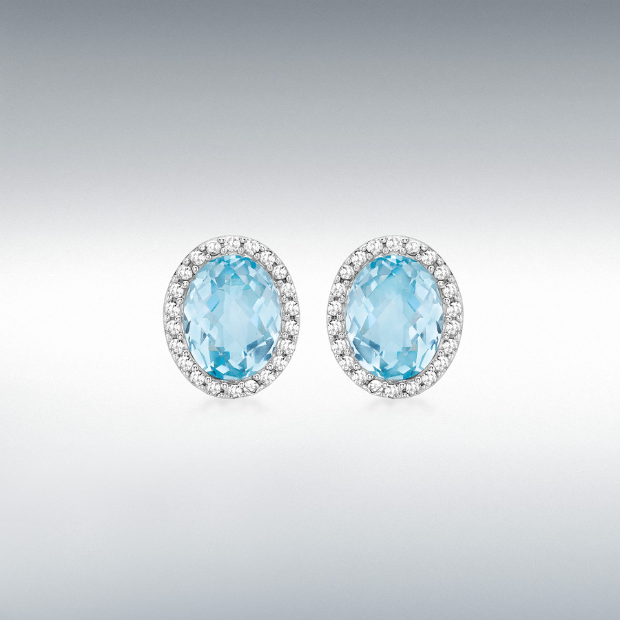 9ct White Gold 0.32ct Diamond and Oval Blue Topaz 10mm x 12mm Stud Earrings
